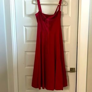 Red dress with slit. Size medium brand new- never worn. 100% polyester